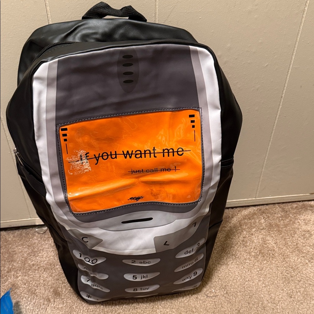 Source Unknown Black and Orange Retro Phone Backpack